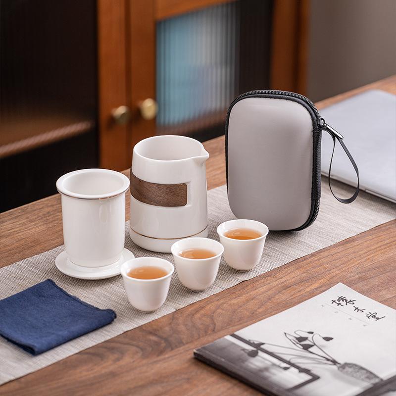 Suet jade white porcelain travel tea set portable storage bag high-end one pot three cups corporate business gifts