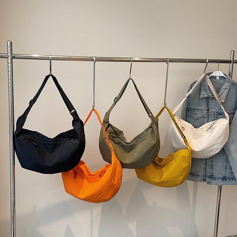 Large capacity nylon bag shoulder messenger bag new urban simple dumpling bag solid color casual student bag