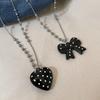 Stylish Long Beaded Necklace Featuring Black Round Dots And Bowknot Love Charm For Casual or Party Wear