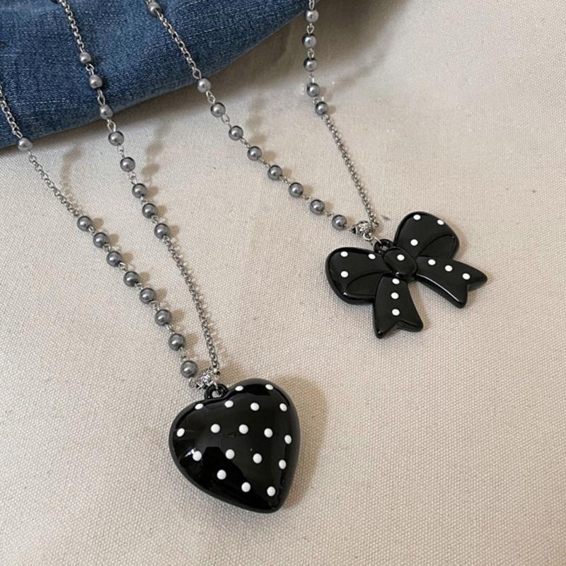 Stylish Long Beaded Necklace Featuring Black Round Dots And Bowknot Love Charm For Casual or Party Wear