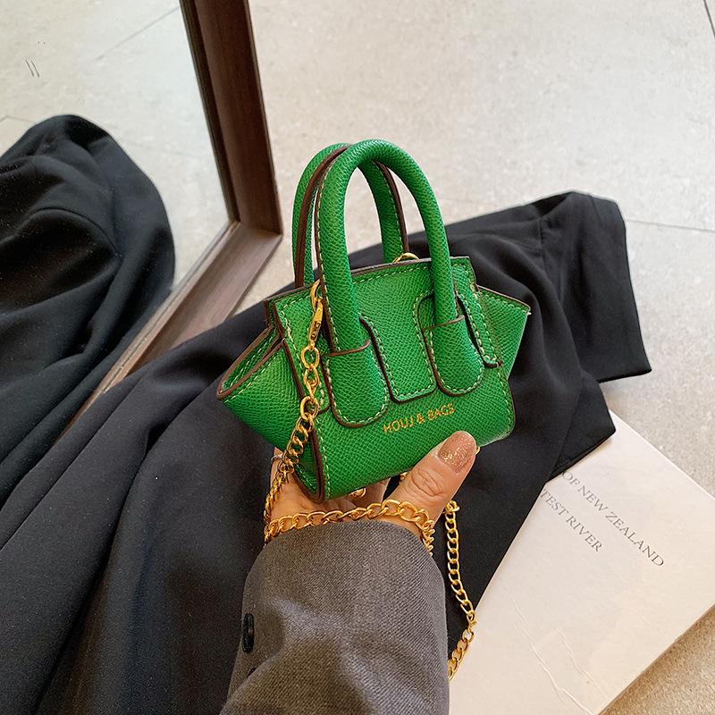 

Foreign-style mini palm pattern portable small bag female 2025 new fashion wing bag foreign-style messenger mouth red envelope зелений