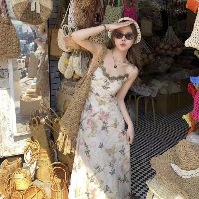 French sleeveless niche floral suspender dress women s waist retro and thin design temperament printed A-shaped skirt S