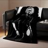 A Stylized Monochromatic Figure with White Hair, Red Lips, and Dark Attire. for All Seasons Blanket Lunch Break Throw Gift
