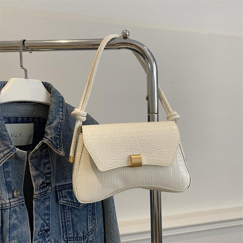 

Сумка премиум-класса женская 2025 новая модная ретро с каменным узором универсальная на плечо подмышку сумка в иностранном стиле для девушки через плечо белый