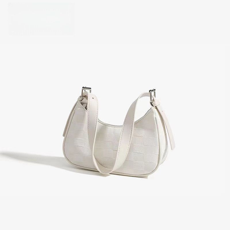 Underarm Bag - Stylish and Sophisticated. An Underarm Bag with A Baguette Shape and A Shoulder Strap.