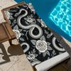 A Microfibre Black Beach Towel Featuring a Snake And Rose Design - Ideal for Summer Days by The Ocean, Fashionable And Absorbent