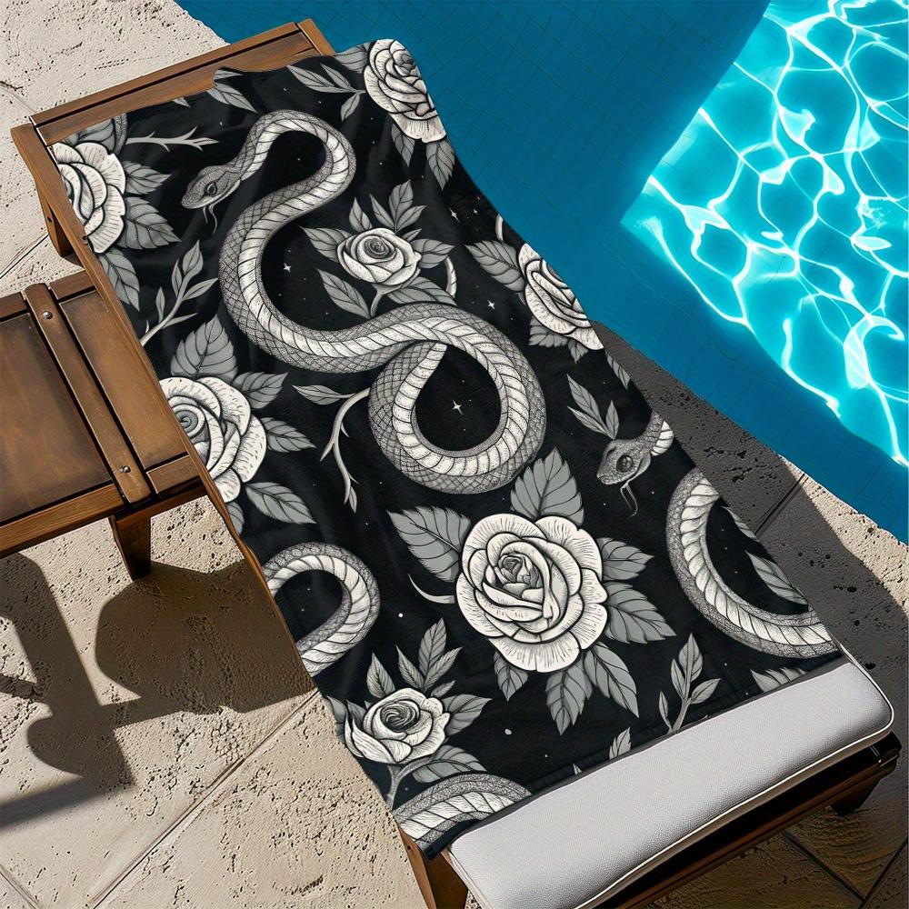 A Microfibre Black Beach Towel Featuring a Snake And Rose Design - Ideal for Summer Days by The Ocean, Fashionable And Absorbent