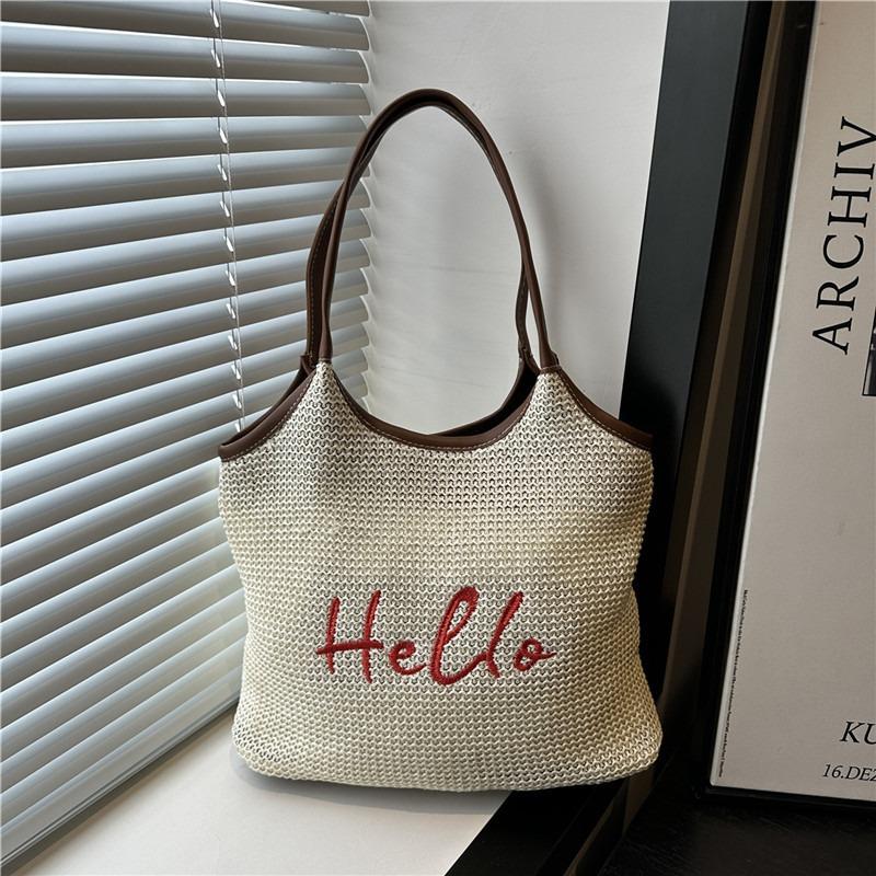 Alphabet woven straw personalized large capacity hollow holiday wind beach shoulder tote bag