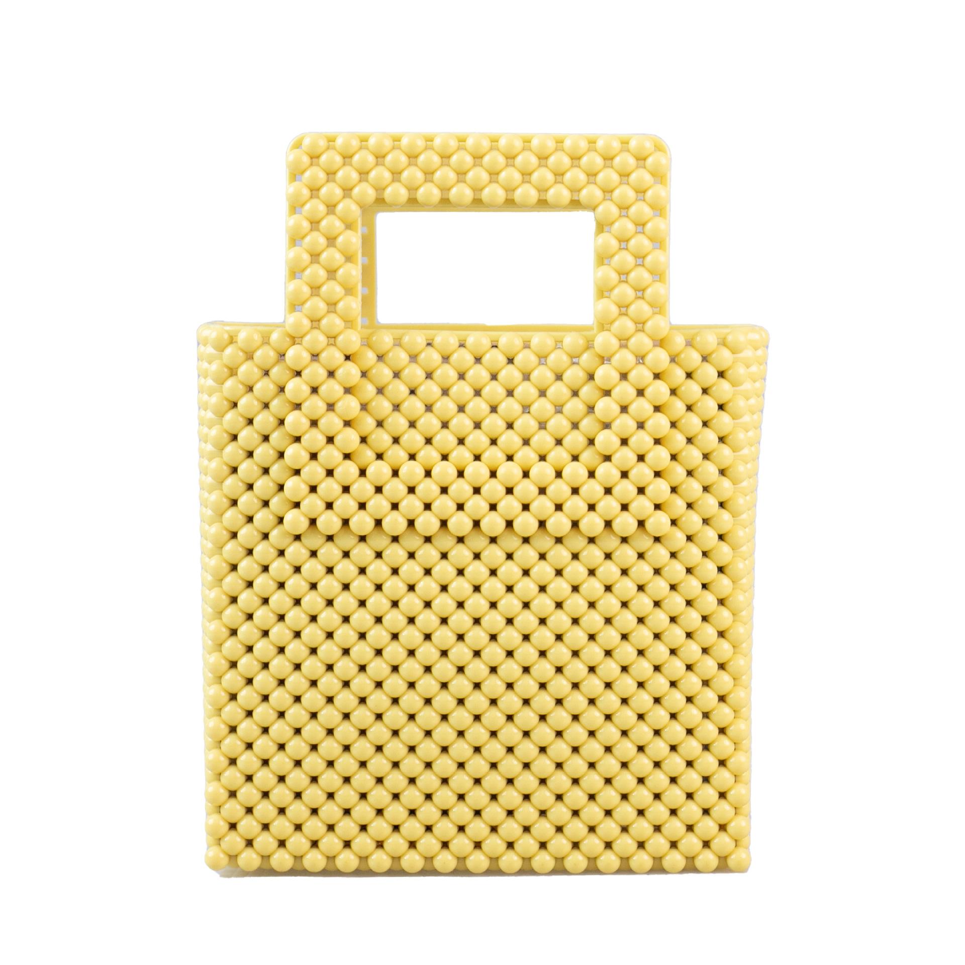 

Нові модні желейні сумки Жіночі ПВХ одноколірні тканини Міцні бруду Легко миються Універсальний нішевий дизайн Ручні сумки Маленькі квадратні сумки