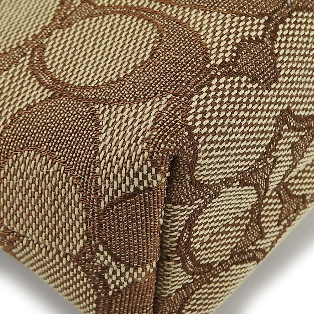 Gebrauchte COACH Umhängetasche F29960 Canvas mit Signature-Muster/Leder beige Dunkelbraun Diagonal getragen