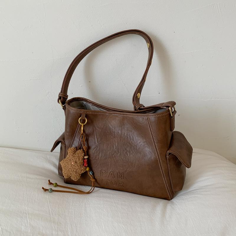 Bags Women's tote bags Large capacity messenger bags 2025 New retro versatile shoulder bags Popular bucket bags this year