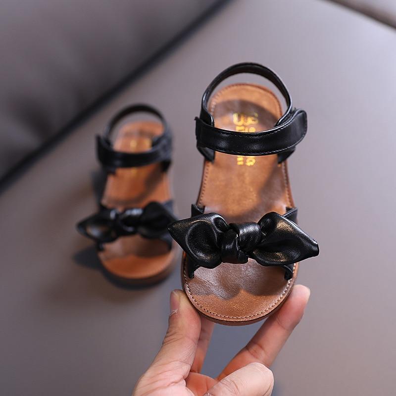 

Повседневная нескользящая мягкая детская обувь для малышей с узлом-бабочкой, летние корейские пляжные сандалии принцессы с открытым носком для маленьких девочек 29 чёрный