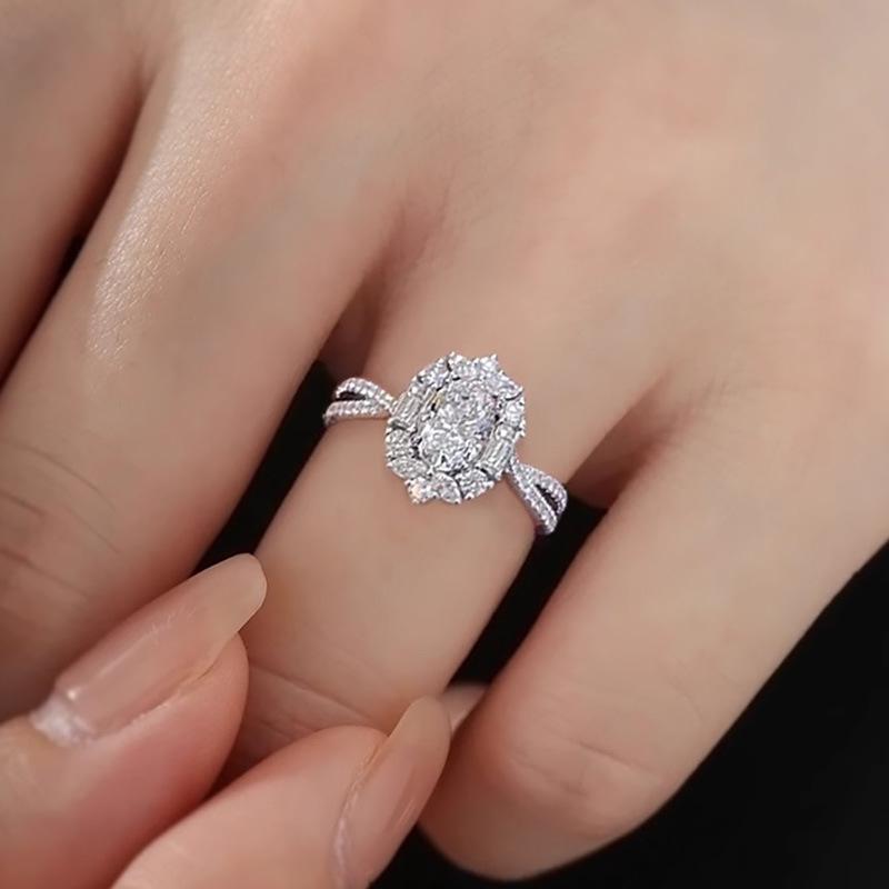 Elegant Simulated Moissanite Ring In White Gold with Pigeon Egg Diamond Design and Zirconia - Women's Luxury Jewelry.