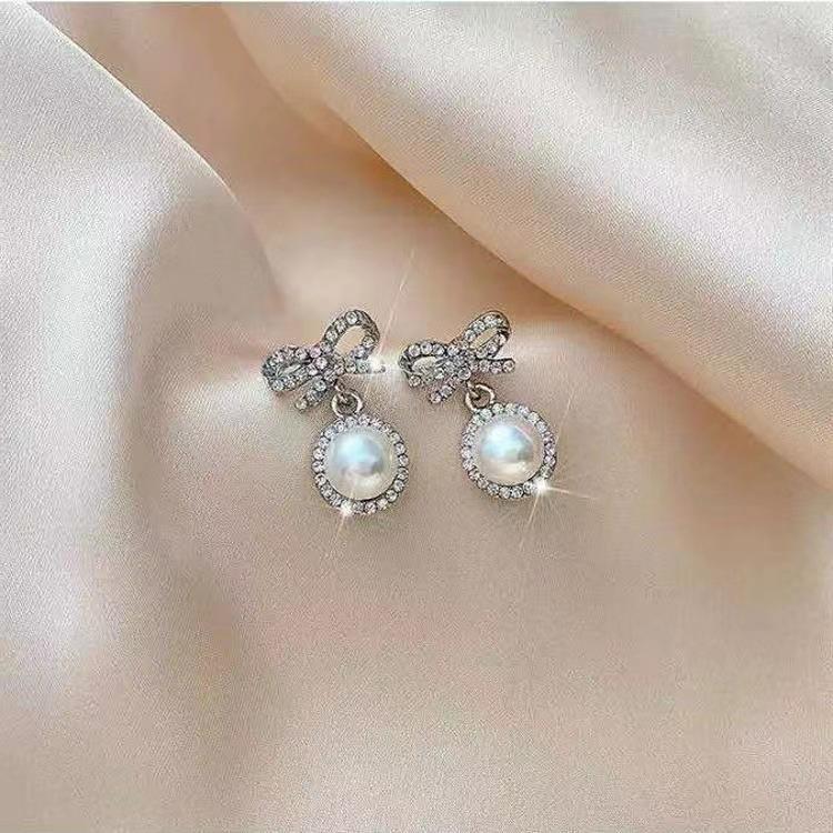 Korean bow highlight pearl diamond earrings women s elegant exquisite niche design versatile earrings tide серебряный