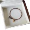 Handwoven Five-Color Cotton Bracelet with Little Fat Fu Pendant - Unisex and Joyful
