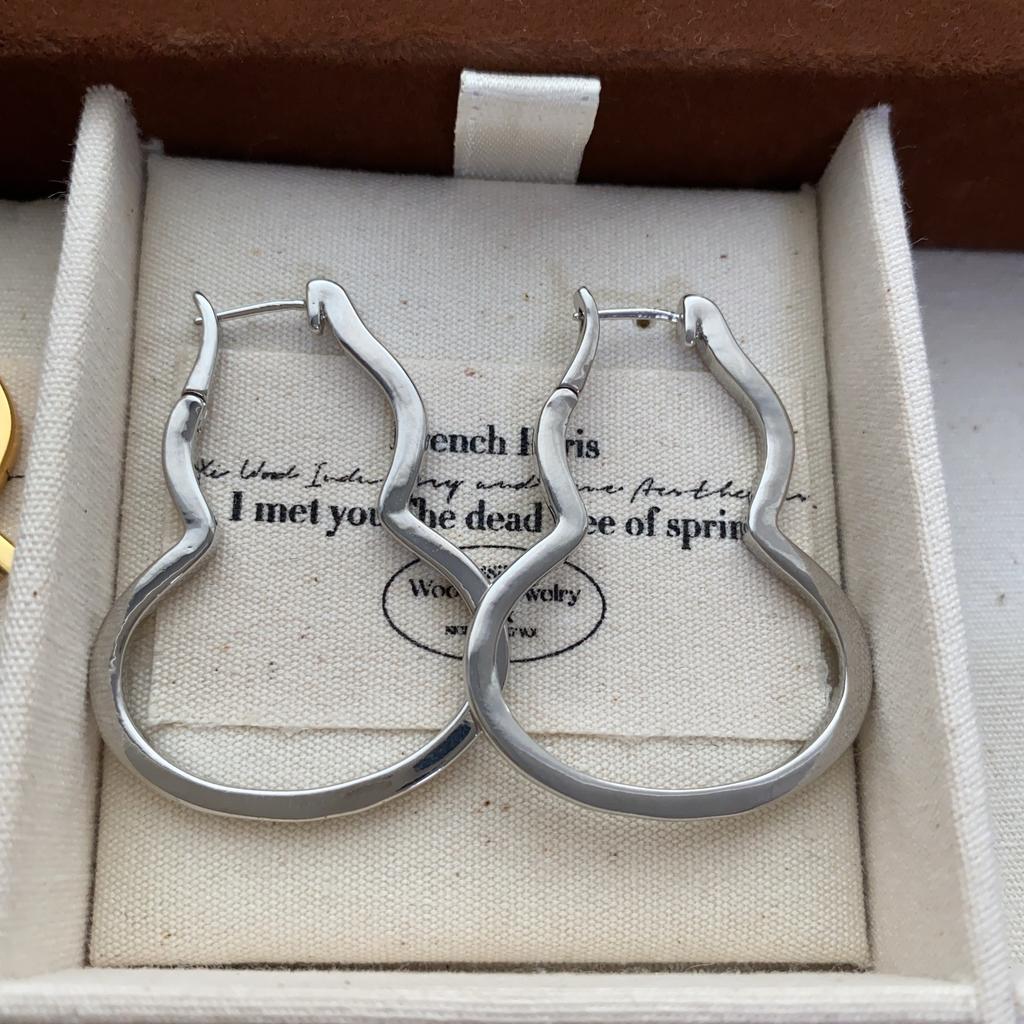 Einfache und modische Kürbis-Ohrringe, Ohrstecker, leichter High-End-Sinn, vielseitig, kalter Wind, Nischendesign, exquisite Ohrringe