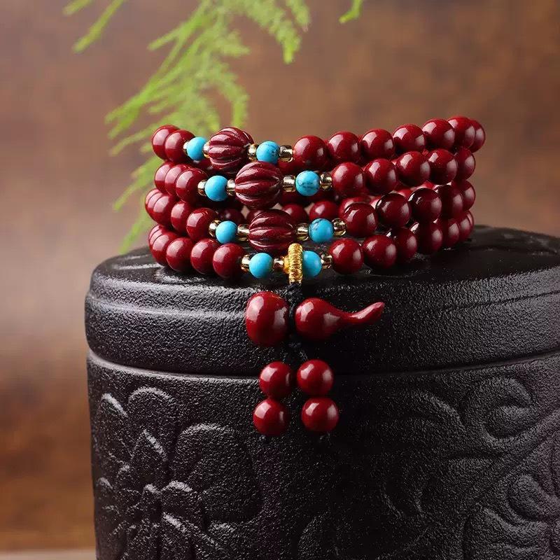 

Unisex Cinnabar Bracelet with Pumpkin Beads and Gourd Pendant - Multi-Turn, Elegant, Unique Design