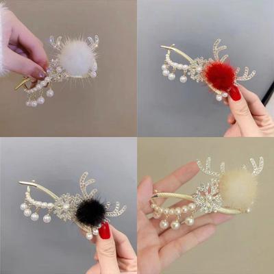 Elegante Pinza para el Pelo con Copo de Nieve, Astas y Pompones para Recogido de Mujer - Edición Otoño/Invierno