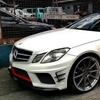 PD Style Body Kit for E-Class W207: Front Bumper, Rear Bumper, Side Skirts, Tailpipes.