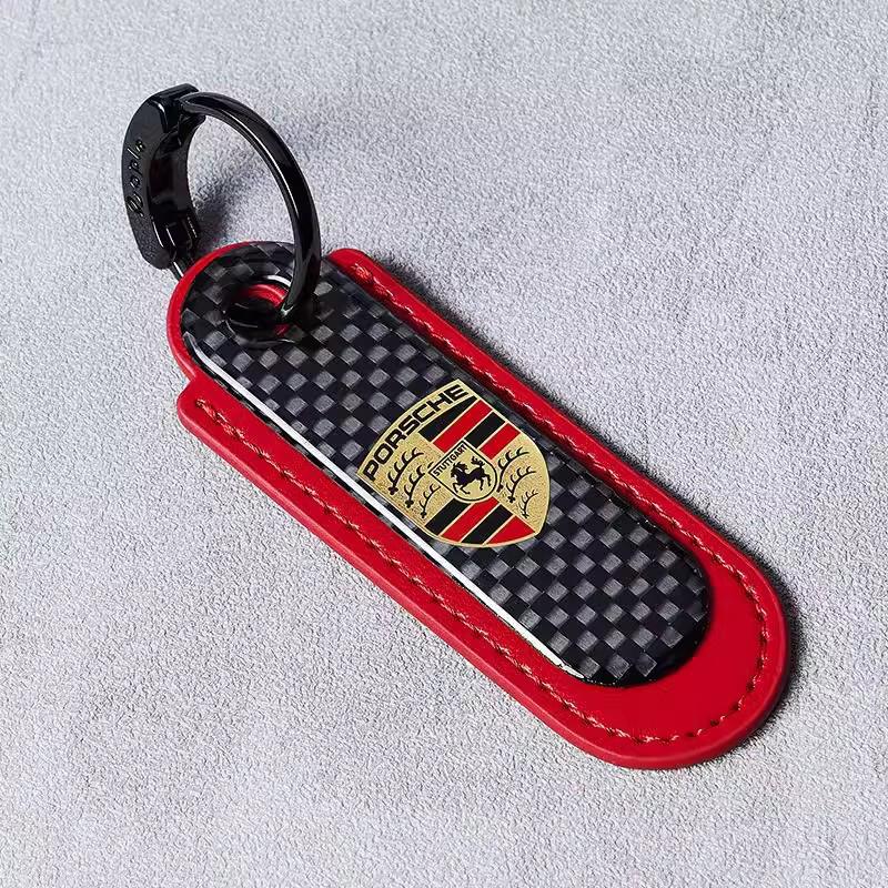 

Car Keychain Decorative Accessories Carbon Fiber Pendant For Porsche Cayenne Panamera Macan 911 718 Taycan Boxster Cayman 918 красный