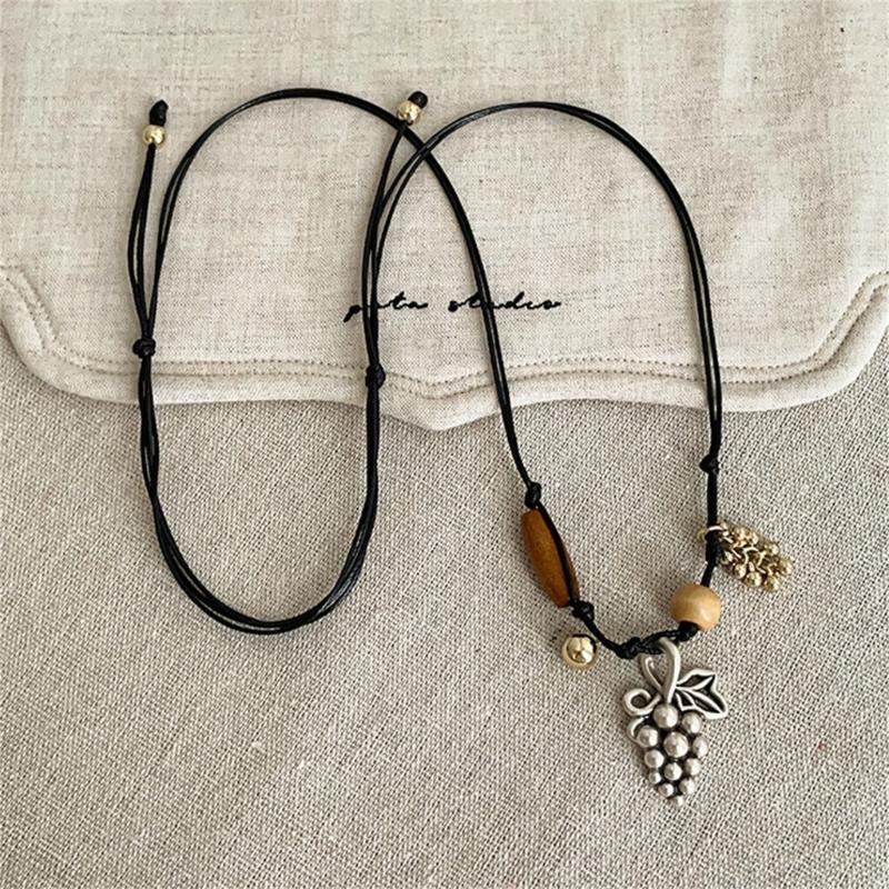 Stylish Alloy Accent Necklace With Sliding Closure Braided Cord and Natural Wood Materials