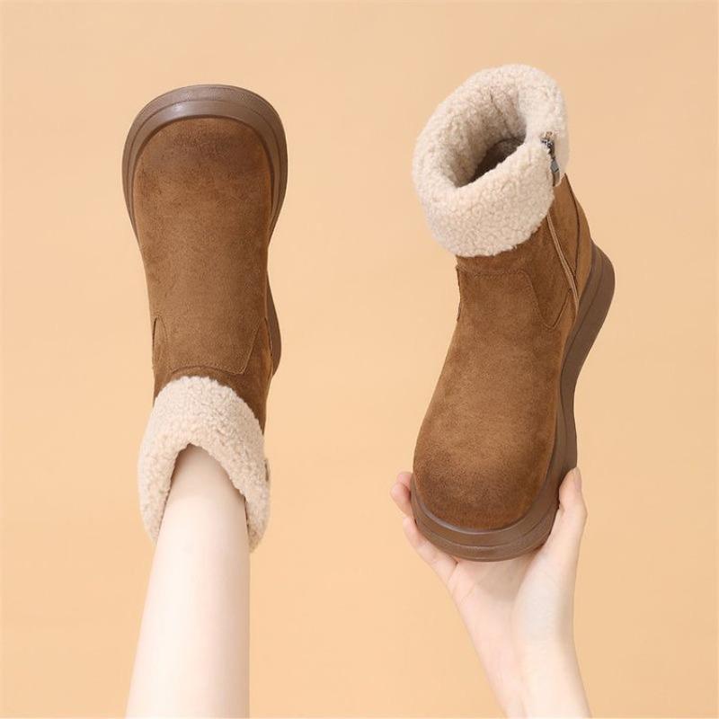 

Женщина носит модные и повседневные флисовые теплые зимние ботинки и хлопковые туфли с круглым носком 40 коричневый