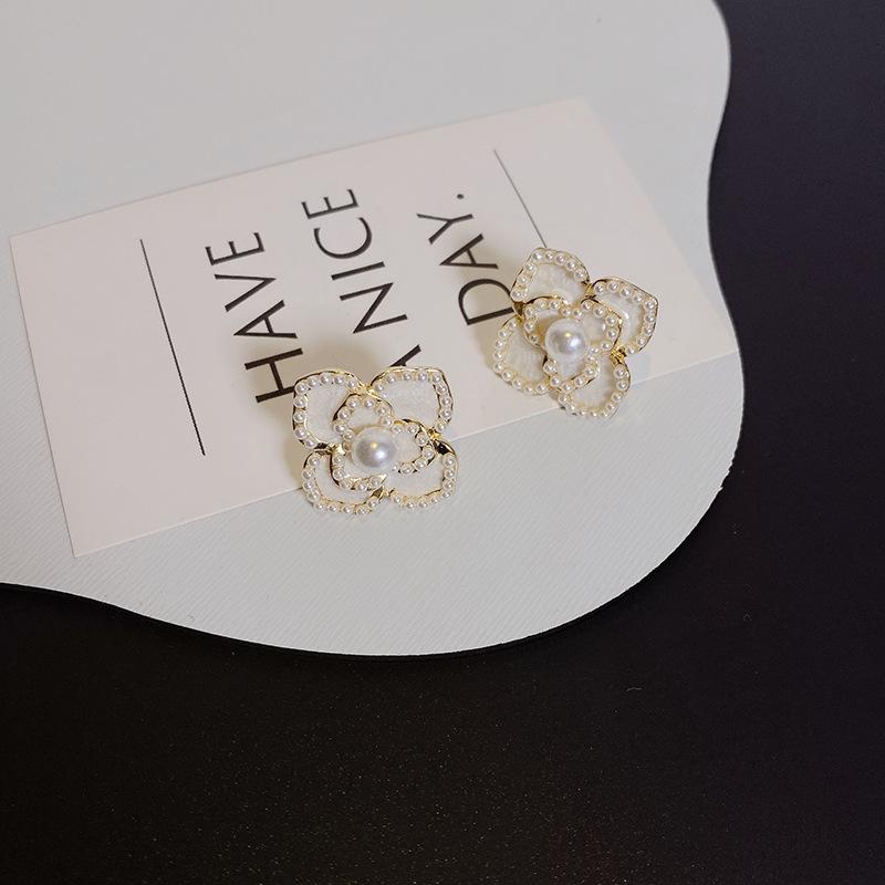 S925 silver needle new camellia fairy flower stud earrings Korea Dongdaemun clothing with earrings tide earrings White k silver