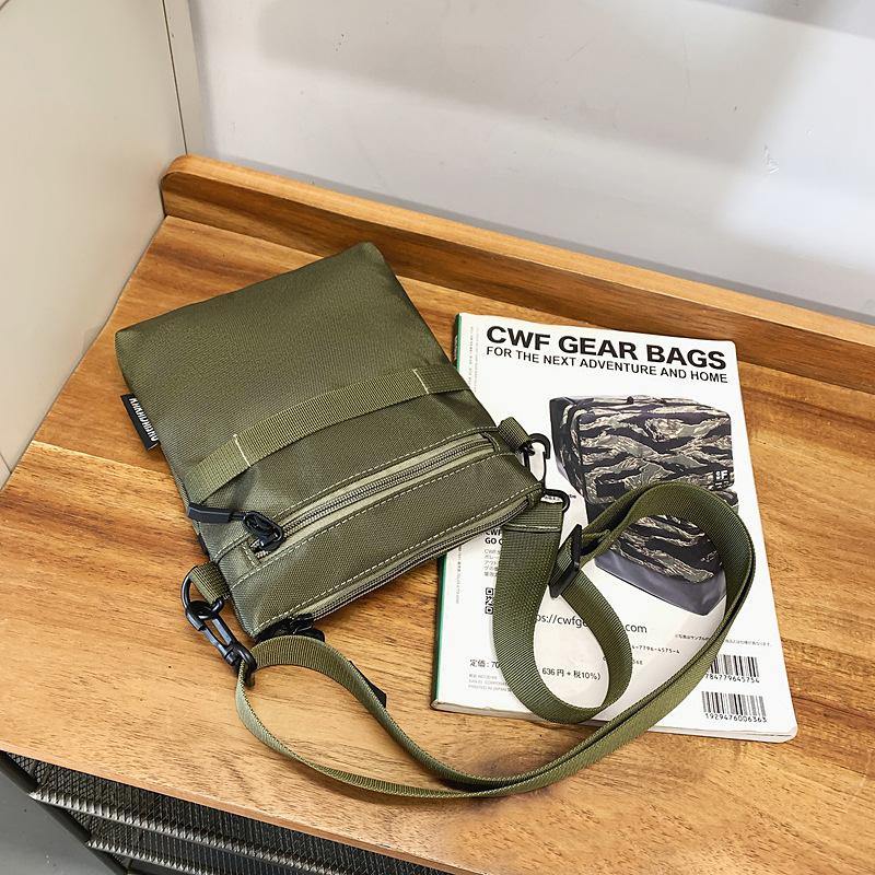 Korean casual trend messenger bag women's summer fashion sports portable Oxford cloth mobile phone bag versatile