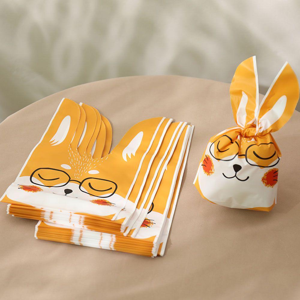 50pcs New Easter Carton Rabbit Ear Bags Plastic Animal Candy Bags For Kids Birthday Biscuits Candy Packaging DIY Gifts Supplies