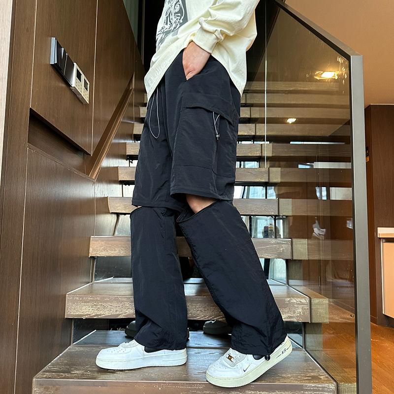 

Американская уличная мода, трендовые лоскутные повседневные брюки карго для мужчин, эластичная талия, карман, быстросохнущие, свободные спортивные прямые брюки L чёрный