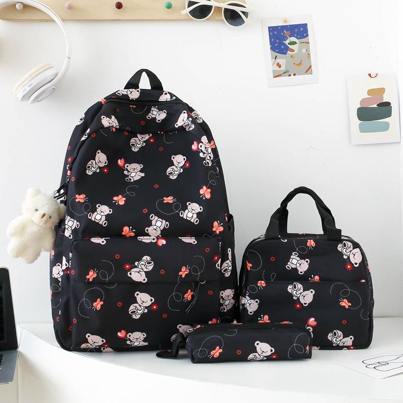 School bag new cute cartoon nylon backpack women's large-capacity middle and high school burden reduction wear-resistant school bag three-piece set