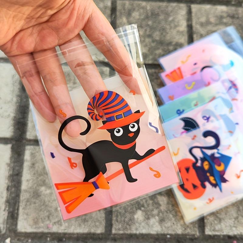 100pcs Halloween Gift Bags. Self-adhesive with pumpkin, ghost & bat designs for party treats.