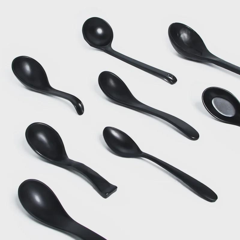 A5 Black Matte Melamine Long Handle Soup Spoon - Food Grade Porcelain Imitation for Restaurants, Hotels, and Hot Pots.