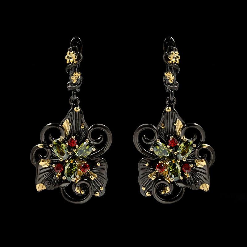

Elegant and Stylish Orchid Earrings In Black Gold and Green Zircon