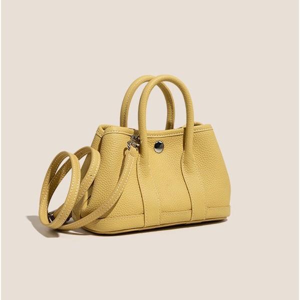 

Garden bag mini cowhide leather one-shoulder crossbody bag female niche high-end sense female office worker small handbag жёлтый