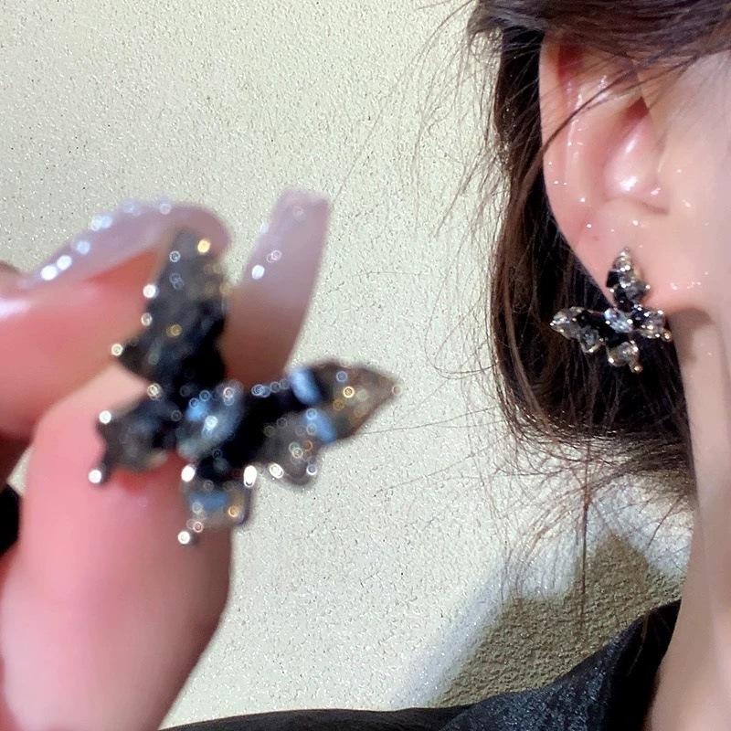 

Cold wind unique black crystal butterfly stud earrings women s light luxury atmospheric earrings new high-end ear accessories