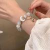 Chic Women's Bell Pendant Bracelet with Crystal Beaded White Flower Design for Outings