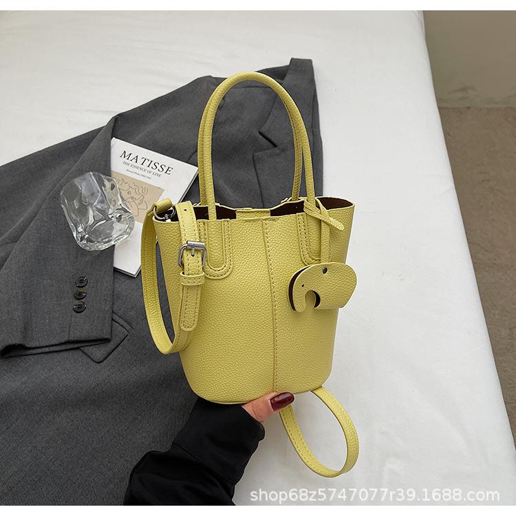 Korean simple style portable bucket bag women's 2025 summer new fashionable and popular one-shoulder crossbody vegetable basket bag