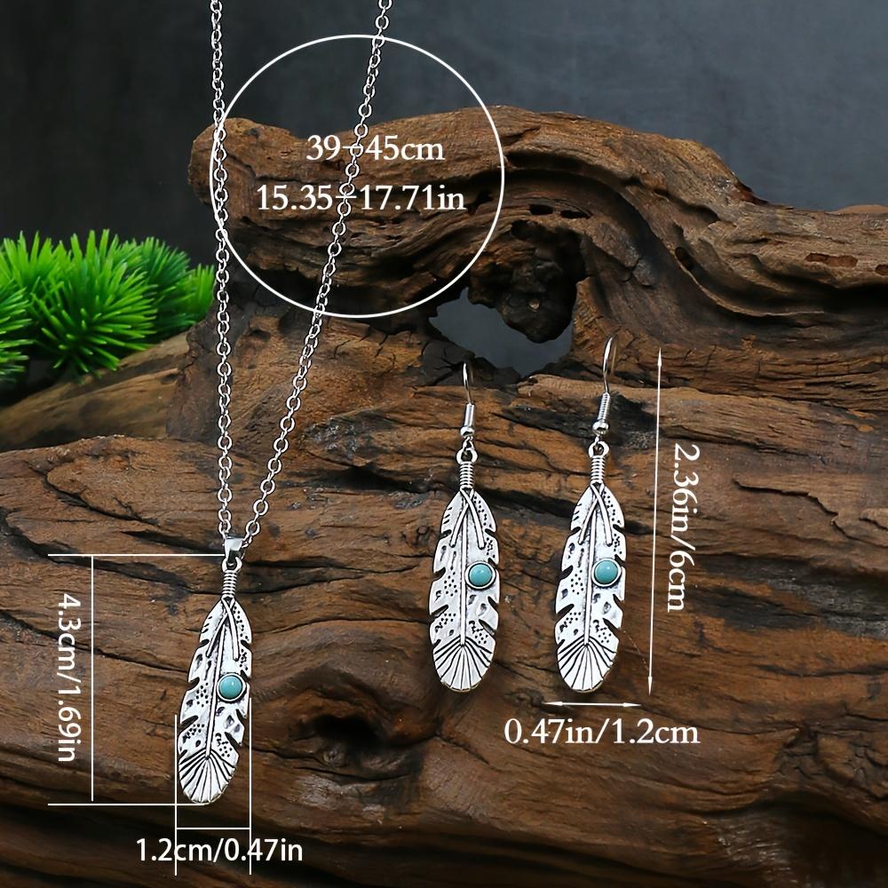 A retro ethnic-style ladies' earring and necklace set, featuring antique silver-colored leaves set in alloy and adorned with turquoise accents,