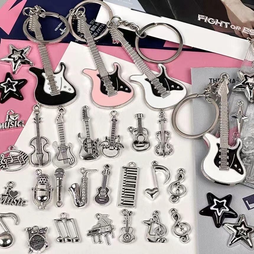 

Silver Y2K Music-Themed DIY Accessories: Guitar, Microphone, Note Card Holder