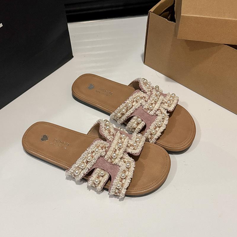 

2025 summer new Xiaoxiangfeng flat-bottomed slippers women wear spring soft-bottomed fairy versatile pearl beach sandals 40 розовый