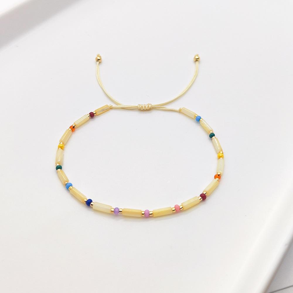 Originales Naturmuschel Zylinderperlen Armband: Fein gewebtes Glücks-Handseil für Frauen