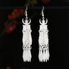 Miaozhai Serie Miao Silberschmuck Horn Ohrringe Retro Lange Glocke Quaste Yunnan Miao Ohrringe