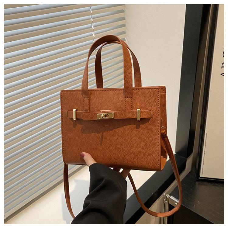 Stor kapacitet sommar vardaglig ny retro mode textur vardaglig bärbar tote crossbody axelväska kvinnor