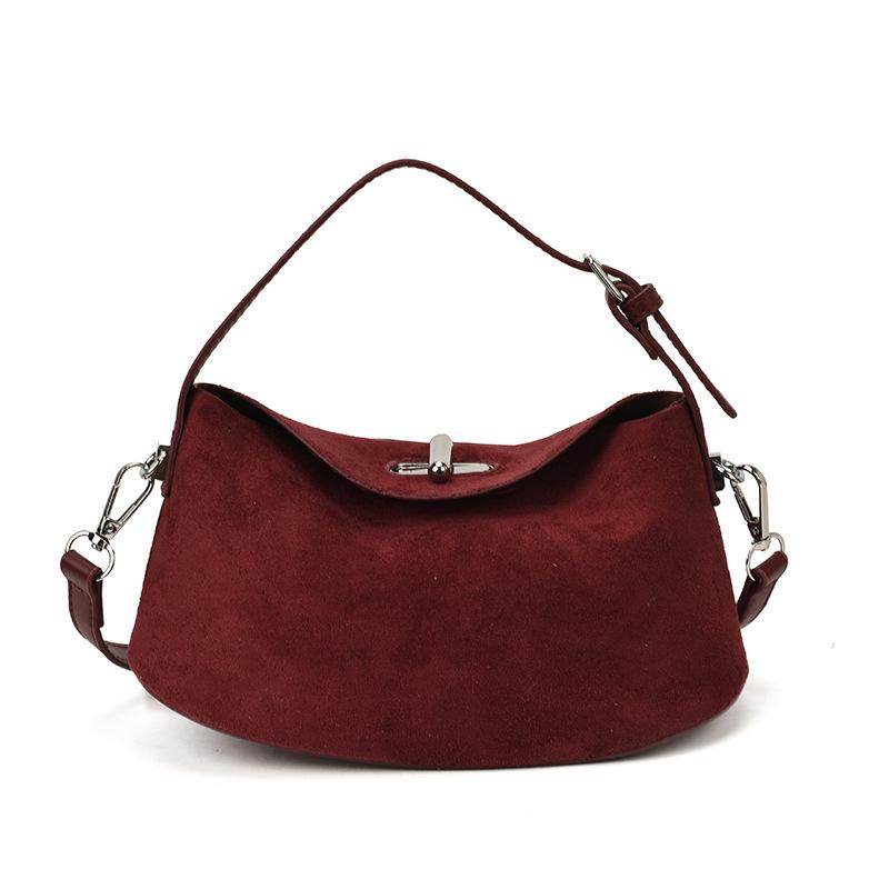 

2025 Women s Retro Trendy Crossbody Dumpling Handbag: Versatile Frosted Single Shoulder Design.
