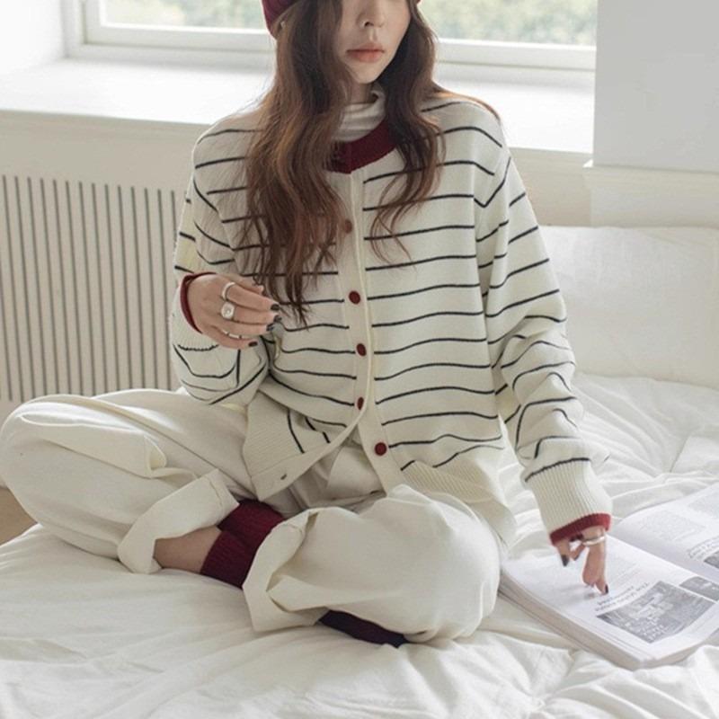Autumn and winter new contrasting color striped knitted cardigan women's design sense versatile temperament niche sweater jacket top