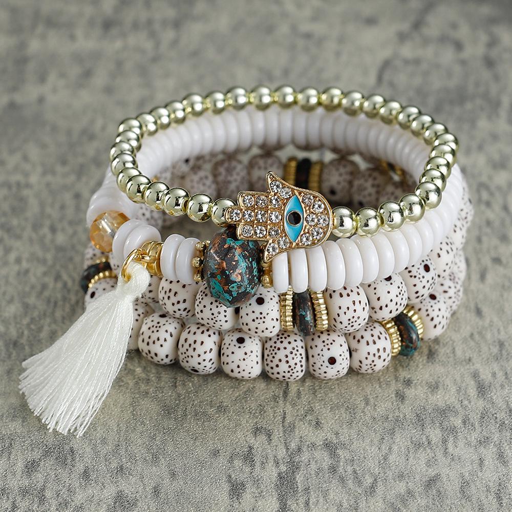 Bracelet bohème multicouches en perles avec pompon et motif palmier contre le mauvais œil pour homme et femme
