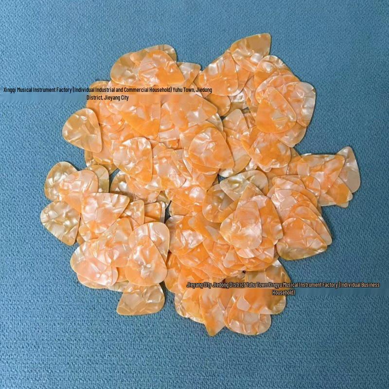 Guitar Accessories: Celluloid Picks in 0.46mm, 0.71mm, 0.96mm, and 1.2mm Sizes. 0.96mm