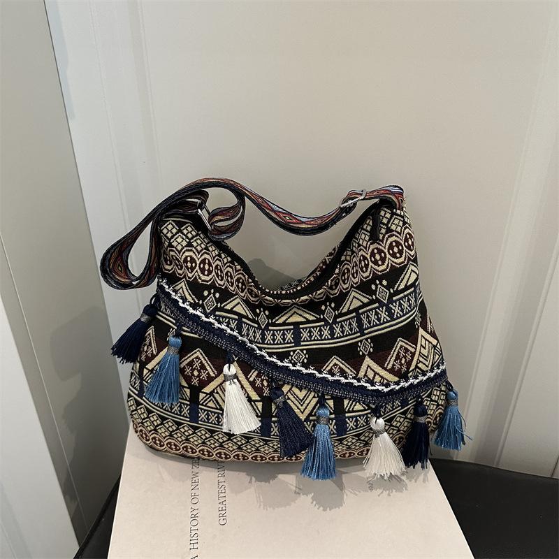 Fashion ethnic style tassel tote bag new niche shoulder bag simple holiday style versatile women's bag