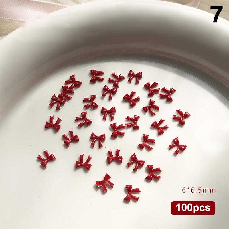 100 Stück 3D Nail Art Rote Schleifen Anhänger Kawaii Harz Zubehör für Maniküre Dekorationen 10 Stück pro Set Nail Art Zubehör